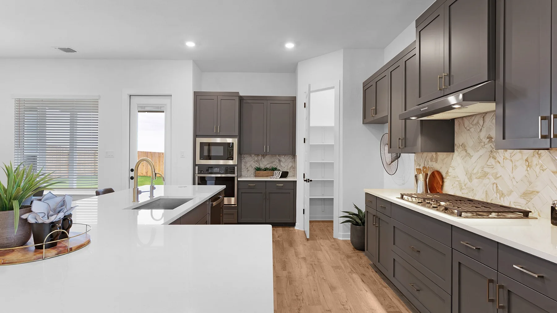 Kitchen of a Chesmar spec home in The Grove at Blackhawk