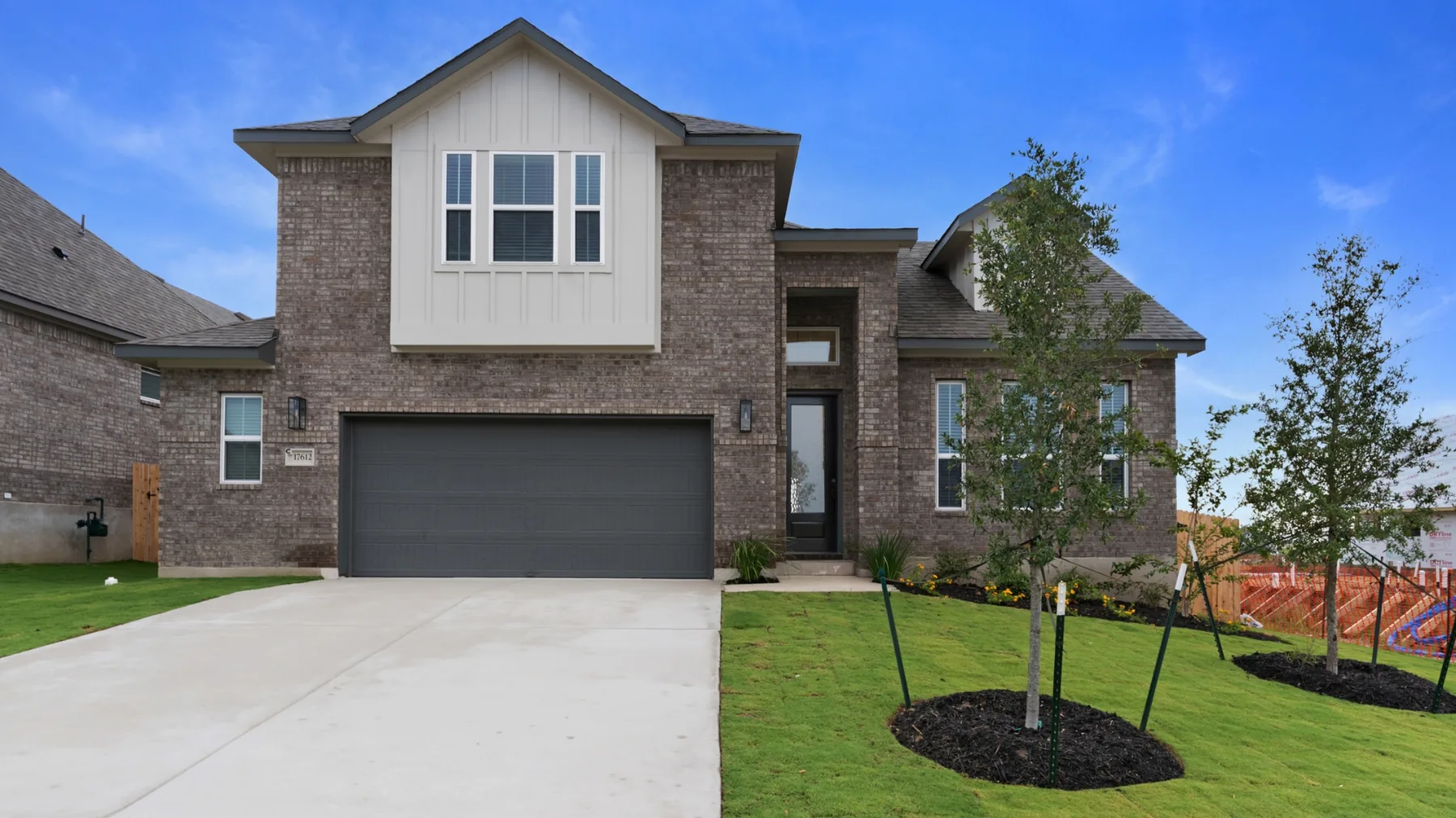 A Chesmar home on Joyce Erna Lane in The Grove at Blackhawk, Pflugerville
