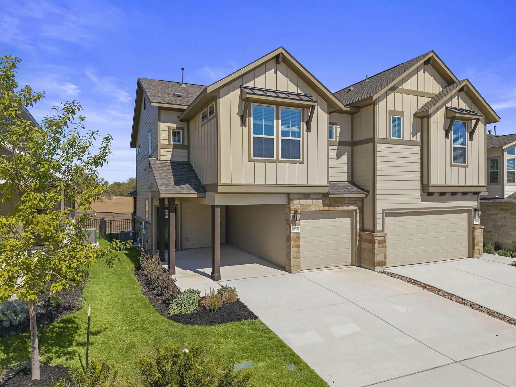 An Empire twin villa on Cornfield Drive in Villas at Rowe, Pflugerville